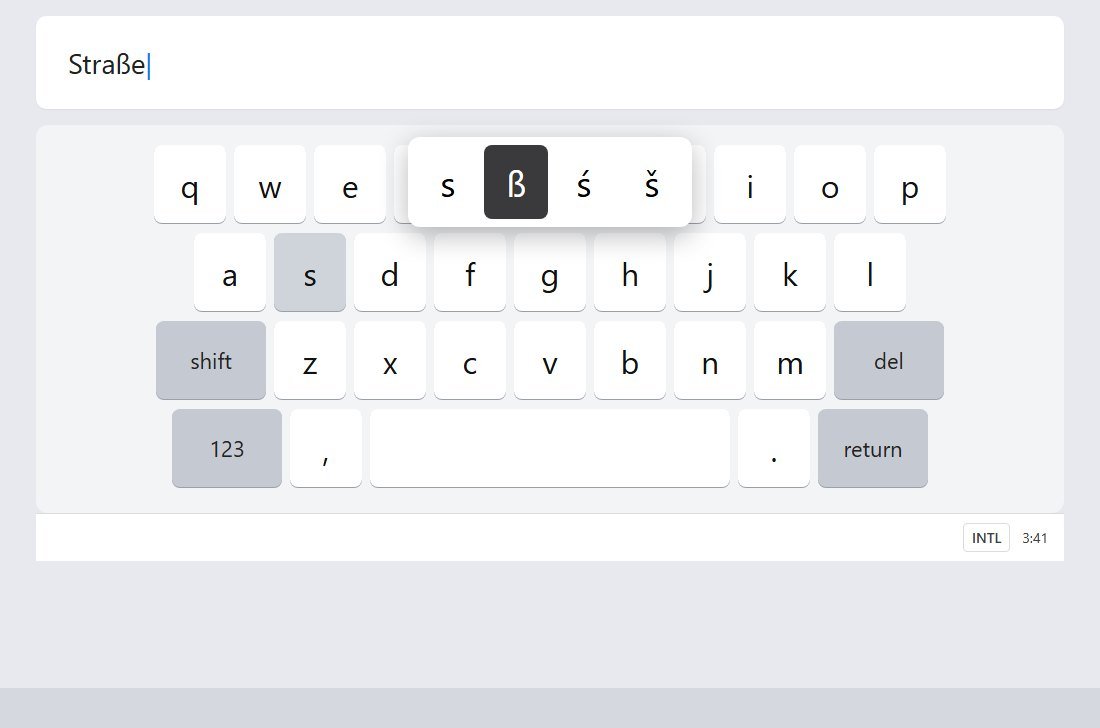 Chromebook keyboard with the hold menu open, ß selected, while typing Straße