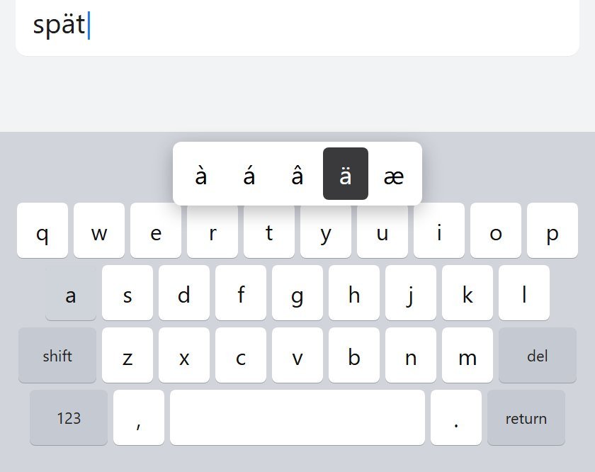 iPhone keyboard with the hold menu open, ä selected, while typing spät