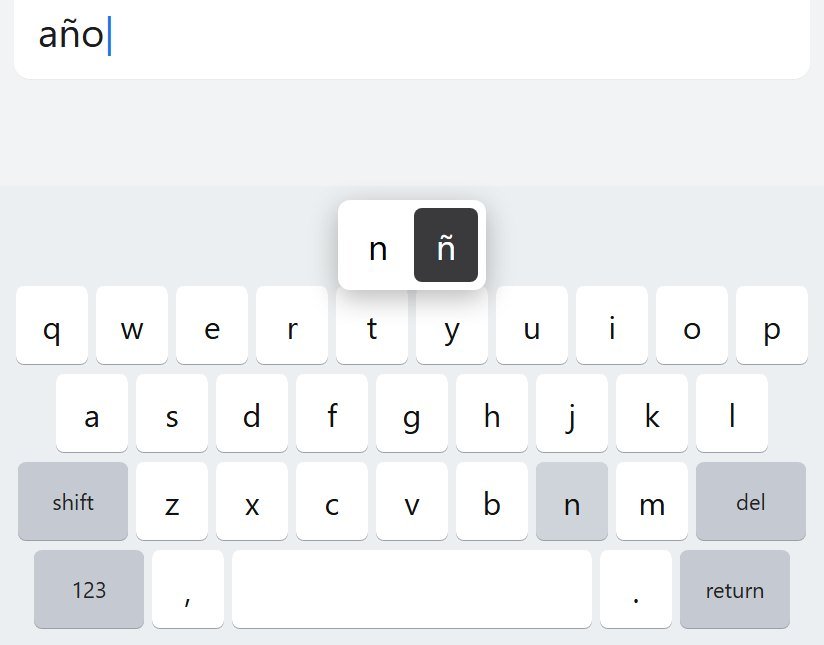 Android keyboard with the hold menu open, ñ selected, while typing año